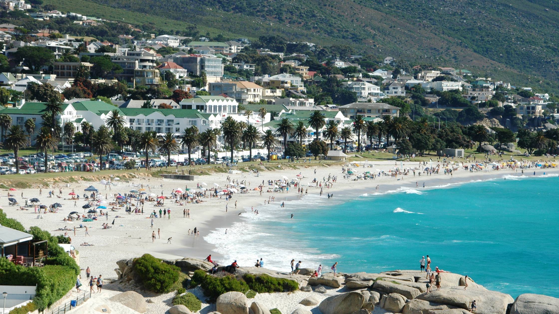 A panoramic view of Camps Bay Beach in Cape Town, South Africa.