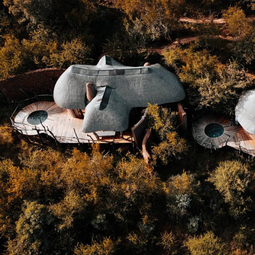 Aerial view of luxury lodges nestled in the South African wilderness